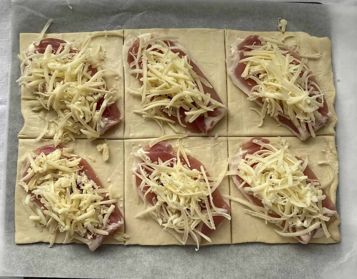 Cheese and Bacon on puff pastry squares.